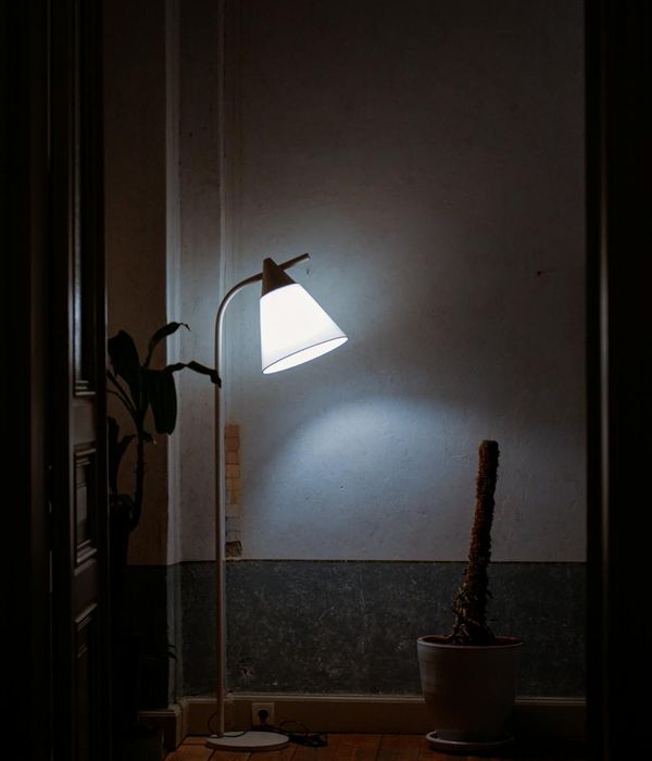 Modern cozy living room with warm ambient lighting and comfortable furniture