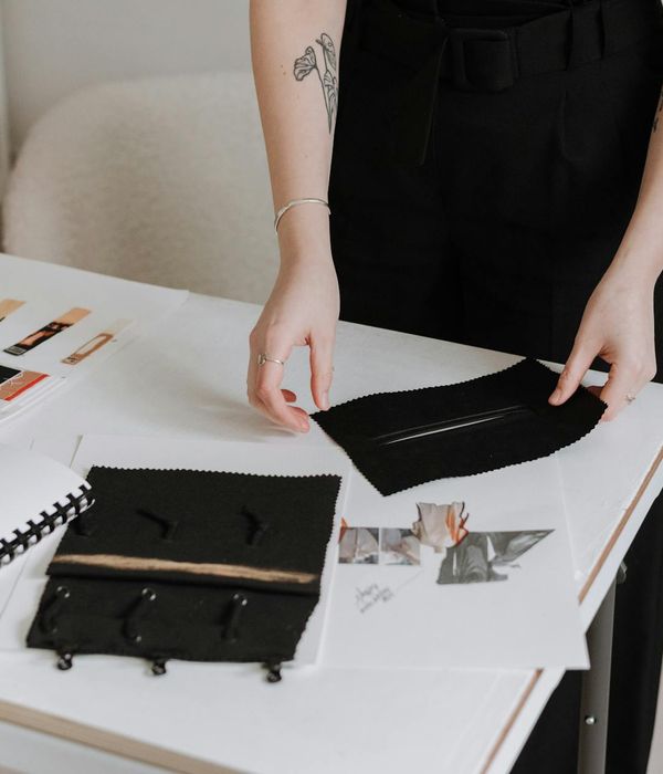 Professional design studio office with meeting area and material samples display